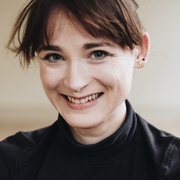 A headshot of Claire Barnes, smiling. 